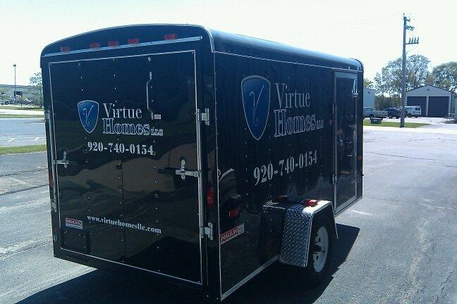 Partial vinyl wrap services for commercial buses, trailers, and semi-trucks by WI Wraps