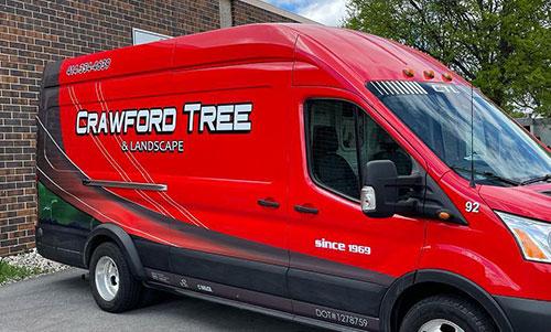 Partial vinyl commercial fleet vehicle wrap services by WI Wraps